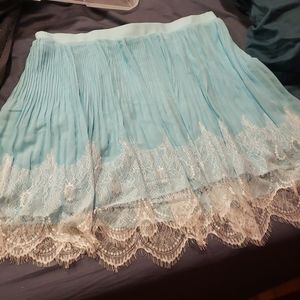 EUC Torrid Baby Blue Skirt with lace trim.